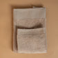 Coppia asciugamani in spugna con bordo decorativo